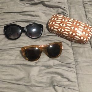 Two sunglasses and a sunglass case